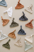 Load image into Gallery viewer, Rust Organic Ribbed Newborn Knot Hat